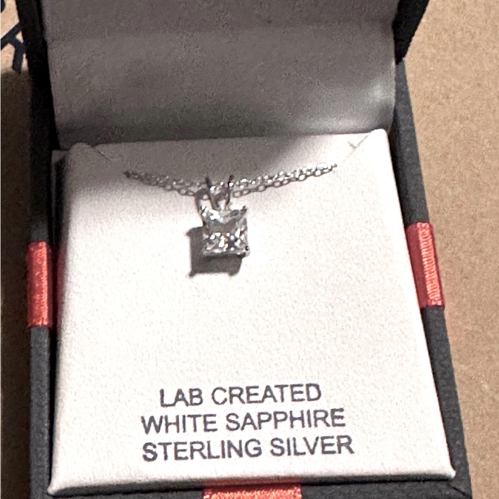 WHITE SAPPHIRE STERLING SILVER
18" PENDANT